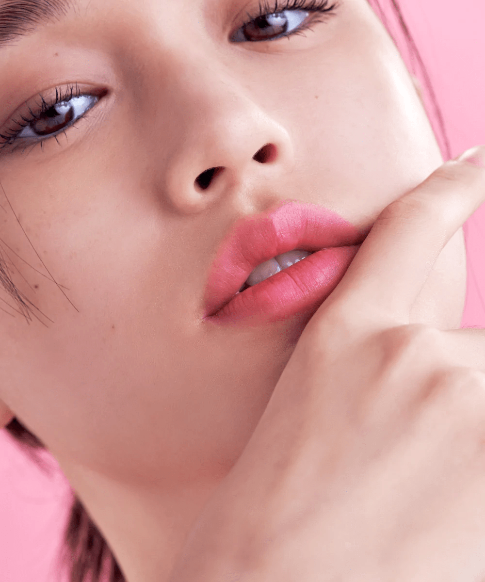 tocobo powder cream lip balm 032 rose petal model looking
