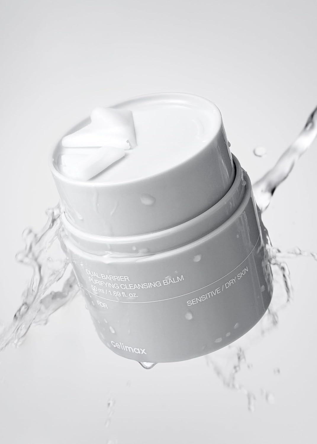 CELIMAX Dual Barrier Purifying Cleansing Balm 3 Take a moredate amount and massage the face gently to remove makeup and skin impurities. 2. Rinse off thoroughly with lukewarm water.